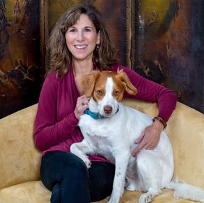 Cindy Delaney, Delaney Meeting & Event Management with dog Milo